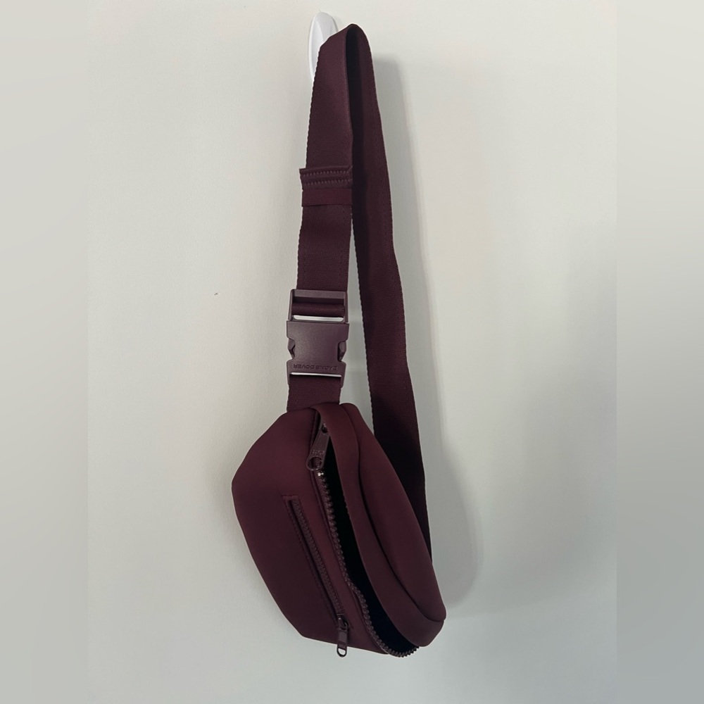 Dagne Dover belt bag in a beautiful wine color.